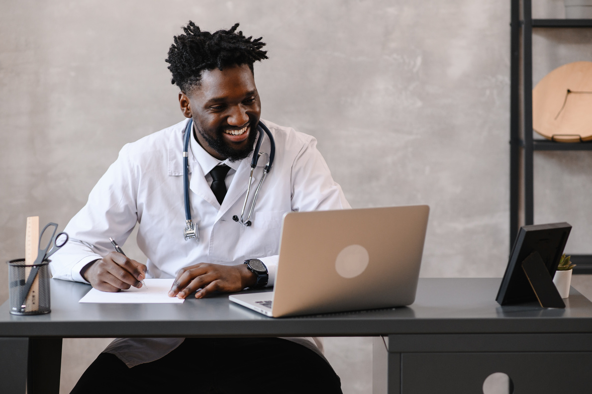 telehealth with virtual doctor appointment and online therapy session. Black doctor online conference